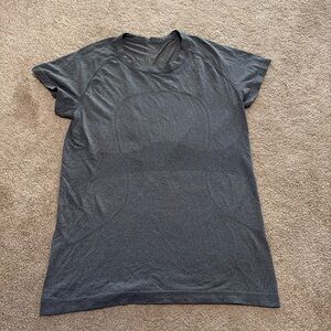 Lululemon Swiftly Tech short sleeve shirt, hip length, size 12